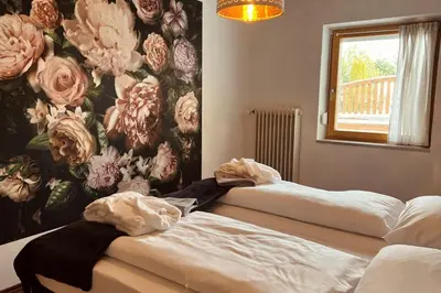 Ein Bett oder Betten in einem Zimmer der Unterkunft Wellnesshotel Waldruh