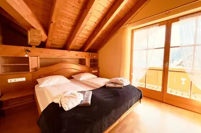 Ein Bett oder Betten in einem Zimmer der Unterkunft Wellnesshotel Waldruh