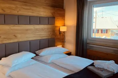 Ein Bett oder Betten in einem Zimmer der Unterkunft Wellnesshotel Waldruh