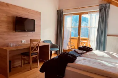 Ein Bett oder Betten in einem Zimmer der Unterkunft Wellnesshotel Waldruh