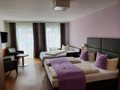 Ein Bett oder Betten in einem Zimmer der Unterkunft Boutique Hotel Beckenlehner