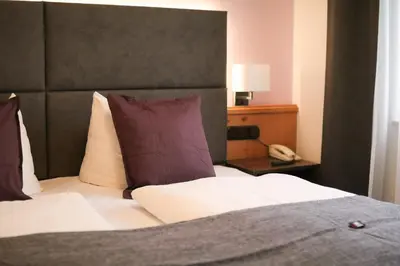 Ein Bett oder Betten in einem Zimmer der Unterkunft Boutique Hotel Beckenlehner