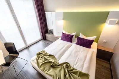 Ein Bett oder Betten in einem Zimmer der Unterkunft Hotel Demas City