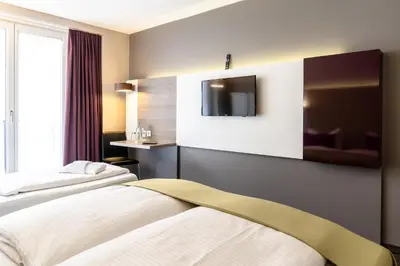 Ein Bett oder Betten in einem Zimmer der Unterkunft Hotel Demas City