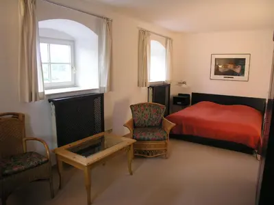 Ein Bett oder Betten in einem Zimmer der Unterkunft Haus Rufinus am Kloster Seeon