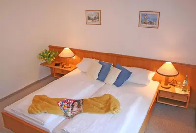 Ein Bett oder Betten in einem Zimmer der Unterkunft Ferienhaus am Römerweg