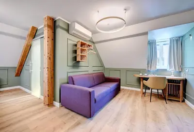 Ein Sitzbereich in der Unterkunft Hotel Uhland