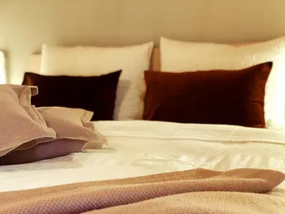 Ein Bett oder Betten in einem Zimmer der Unterkunft Ferienwohnungen Evi Huber