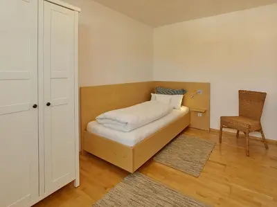 Ein Bett oder Betten in einem Zimmer der Unterkunft Ferienwohnungen Evi Huber