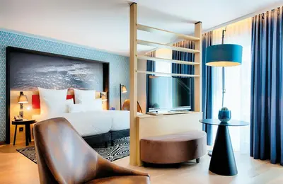 Ein Bett oder Betten in einem Zimmer der Unterkunft NYX Hotel Munich by Leonardo Hotels
