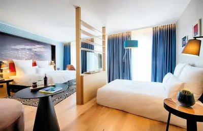 Ein Bett oder Betten in einem Zimmer der Unterkunft NYX Hotel Munich by Leonardo Hotels