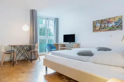 Ein Bett oder Betten in einem Zimmer der Unterkunft Hapimag Ferienwohnungen München
