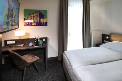 Ein Bett oder Betten in einem Zimmer der Unterkunft Hotel Südstern