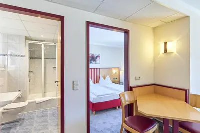 Ein Badezimmer in der Unterkunft Apartments Aschheim