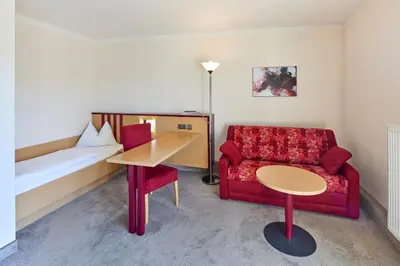 Ein Sitzbereich in der Unterkunft Apartments Aschheim