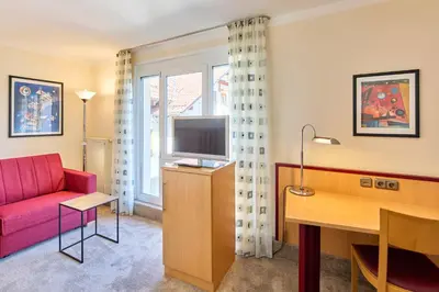 TV/Unterhaltungsangebot in der Unterkunft Apartments Aschheim