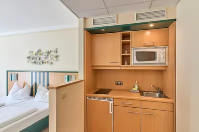 Küche/Küchenzeile in der Unterkunft Apartments Aschheim