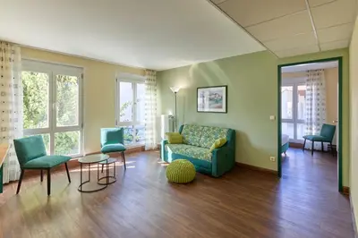 Ein Sitzbereich in der Unterkunft Apartments Aschheim