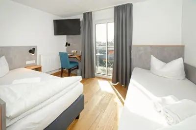 Ein Bett oder Betten in einem Zimmer der Unterkunft Hotel 17 Seen