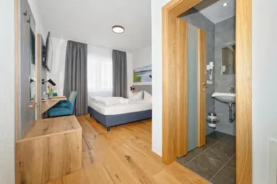 Ein Bett oder Betten in einem Zimmer der Unterkunft Hotel 17 Seen