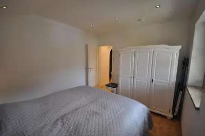 Ein Bett oder Betten in einem Zimmer der Unterkunft Apartment am Mohrenplatz