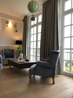 Ein Sitzbereich in der Unterkunft The Starnbergsee Hideaway