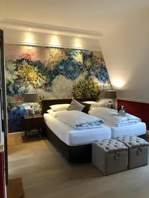 Ein Bett oder Betten in einem Zimmer der Unterkunft The Starnbergsee Hideaway