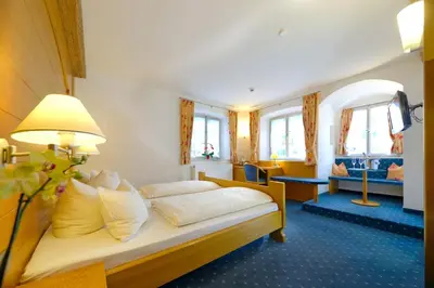 Ein Bett oder Betten in einem Zimmer der Unterkunft Hotel Alte Post