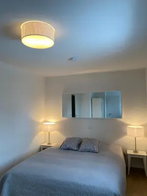 Ein Bett oder Betten in einem Zimmer der Unterkunft Gästehaus Maria