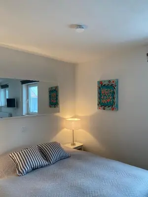 Ein Bett oder Betten in einem Zimmer der Unterkunft Gästehaus Maria