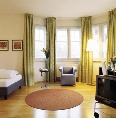 Ein Bett oder Betten in einem Zimmer der Unterkunft Seeresidenz Alte Post
