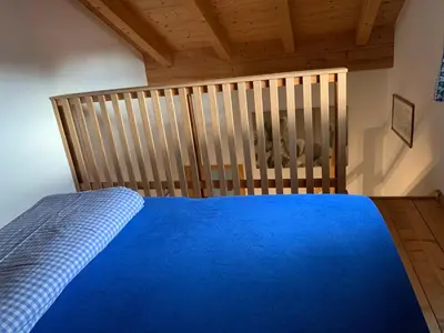 Ein Bett oder Betten in einem Zimmer der Unterkunft Ferienwohnung Bacher