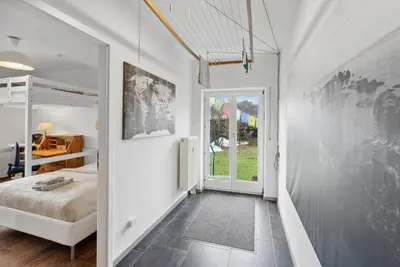 Ein Bett oder Betten in einem Zimmer der Unterkunft MAKE FEWO Kellermann Barrierefreie Ferienwohnung Garten Kamin 30 min München