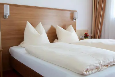 Ein Bett oder Betten in einem Zimmer der Unterkunft Gästehaus am Rastberg