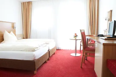 Ein Bett oder Betten in einem Zimmer der Unterkunft Gästehaus am Rastberg