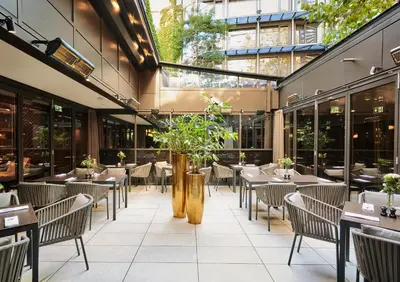 Ein Restaurant oder anderes Speiselokal in der Unterkunft Living Hotel Das Viktualienmarkt