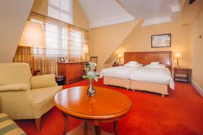 Ein Bett oder Betten in einem Zimmer der Unterkunft Hotel Moosburger Hof