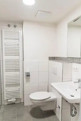 Ein Badezimmer in der Unterkunft Hotel Staffelseestraße