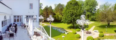 Ein Garten an der Unterkunft Hotel Sonnengarten