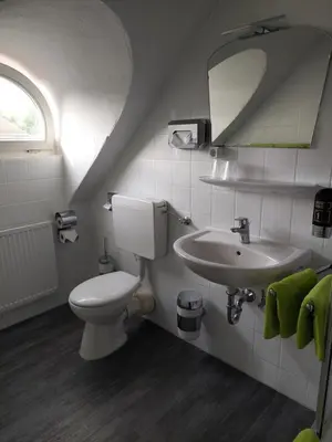 Ein Badezimmer in der Unterkunft Der Heurige im Gasthaus zum Löwen