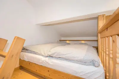 Ein Bett oder Betten in einem Zimmer der Unterkunft Studio Murnauer Moos
