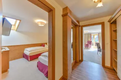 Ein Bett oder Betten in einem Zimmer der Unterkunft Posthotel Hofherr