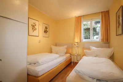 Ein Bett oder Betten in einem Zimmer der Unterkunft Ferienwohnungen Jell - Forg