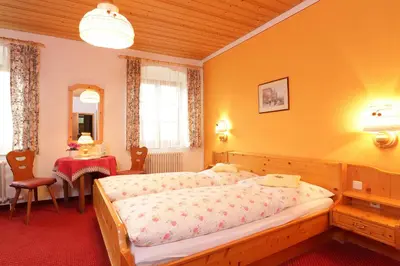 Ein Bett oder Betten in einem Zimmer der Unterkunft Gasthaus zur Moosmühle