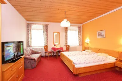 Ein Bett oder Betten in einem Zimmer der Unterkunft Gasthaus zur Moosmühle