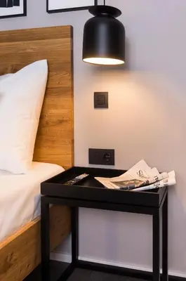 Ein Bett oder Betten in einem Zimmer der Unterkunft Timehouse Serviced Apartments