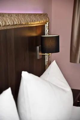 Ein Bett oder Betten in einem Zimmer der Unterkunft Pension Langerspacher
