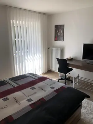 Ein Bett oder Betten in einem Zimmer der Unterkunft Wolfˋs Apartment
