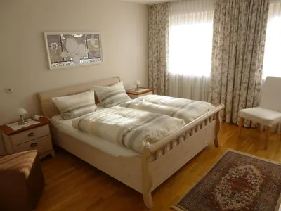 Ein Bett oder Betten in einem Zimmer der Unterkunft Ferienwohnung Edmeier