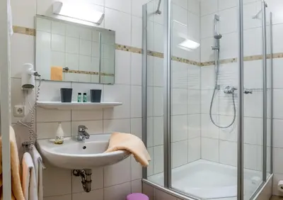 Ein Badezimmer in der Unterkunft Werdenfelser Hof